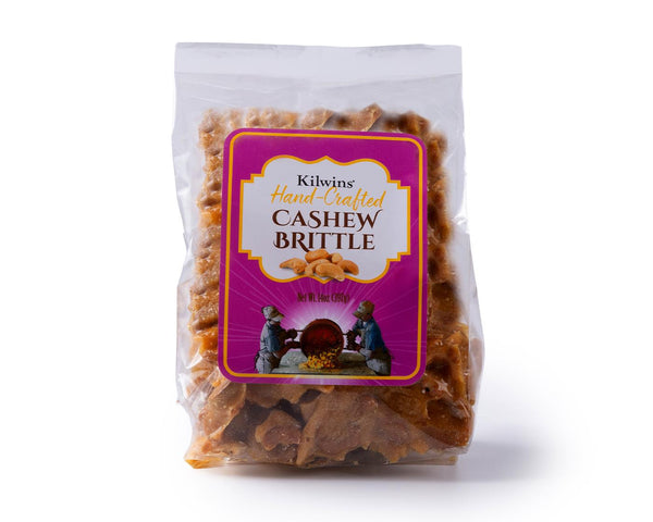 Clear bag of Kilwins hand-crafted cashew brittle with a purple label.