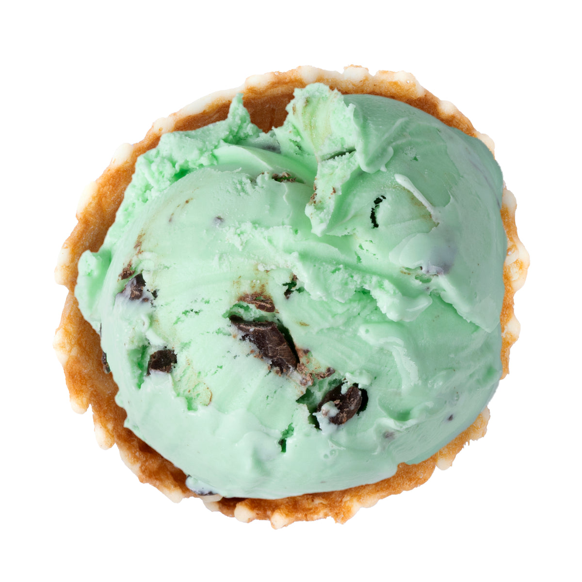 A scoop of mint green ice cream with dark cookie pieces, served in a golden-brown waffle cone on a white background.