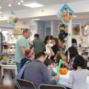 Interior picture of the store with family activity time