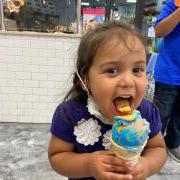 Photo of little girl eating Ice Cream Cone