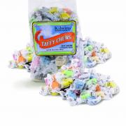 Photo of bag of Kilwins Taffy with loose Taffy scattered in front