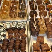 Photo of miscellaneous made-in-store Chocolate-Dipped and Caramel-Dipped treats on trays