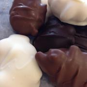 Photo of array of Kilwins Tuttles in Milk, Dark and White Chocolate