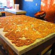 Kilwins Peanut Brittle cooling on the table