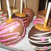 Photo of an array of different Caramel Apples on a tray