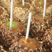 Photo of Caramel Apples with nuts on tray