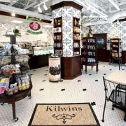 Photo of interior of Kilwins Geneva, IL store with products on display