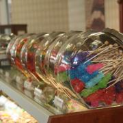 Photo of jars of brightly colored candy